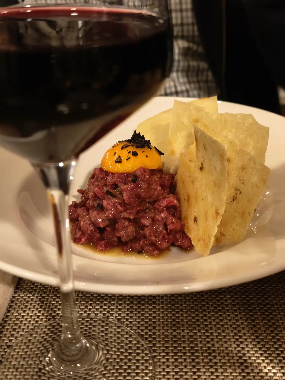 Wagyu beef tartare with a glass of wine